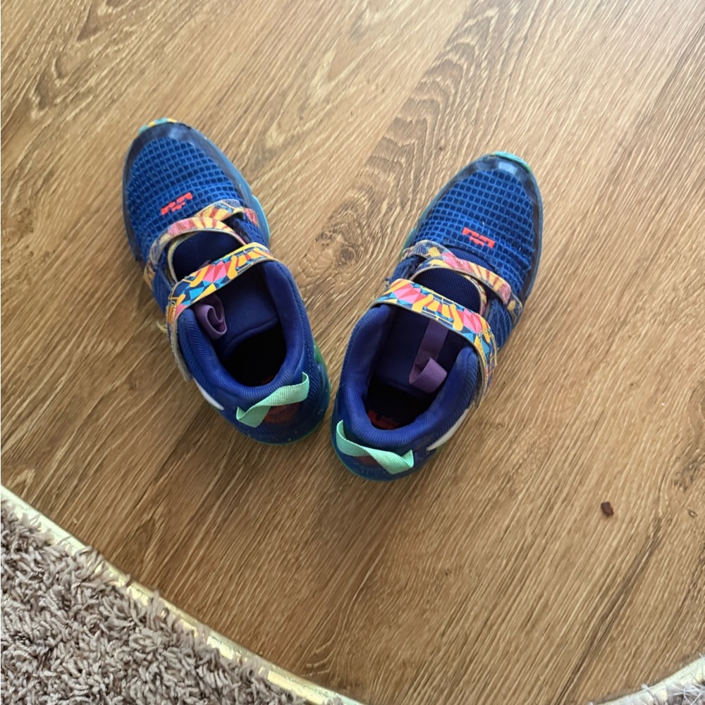 Nike Blue Sneakers with Lace-Up Design and Athletic Build